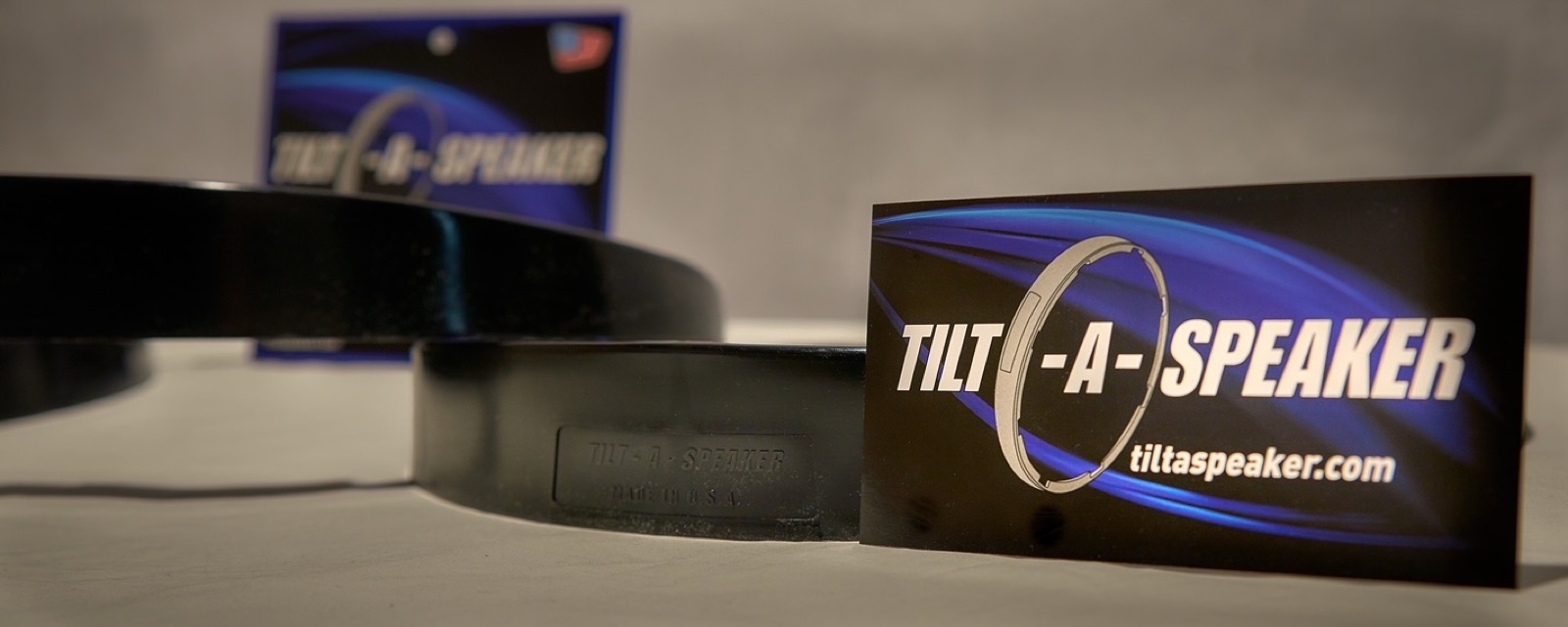 Tilt-A-Speaker adapter ring with its packaging